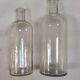Pair of former pharmaceutical glass bottles
