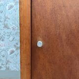 Vintage sideboard with sliding doors