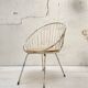 Basket armchair in metal and wood.