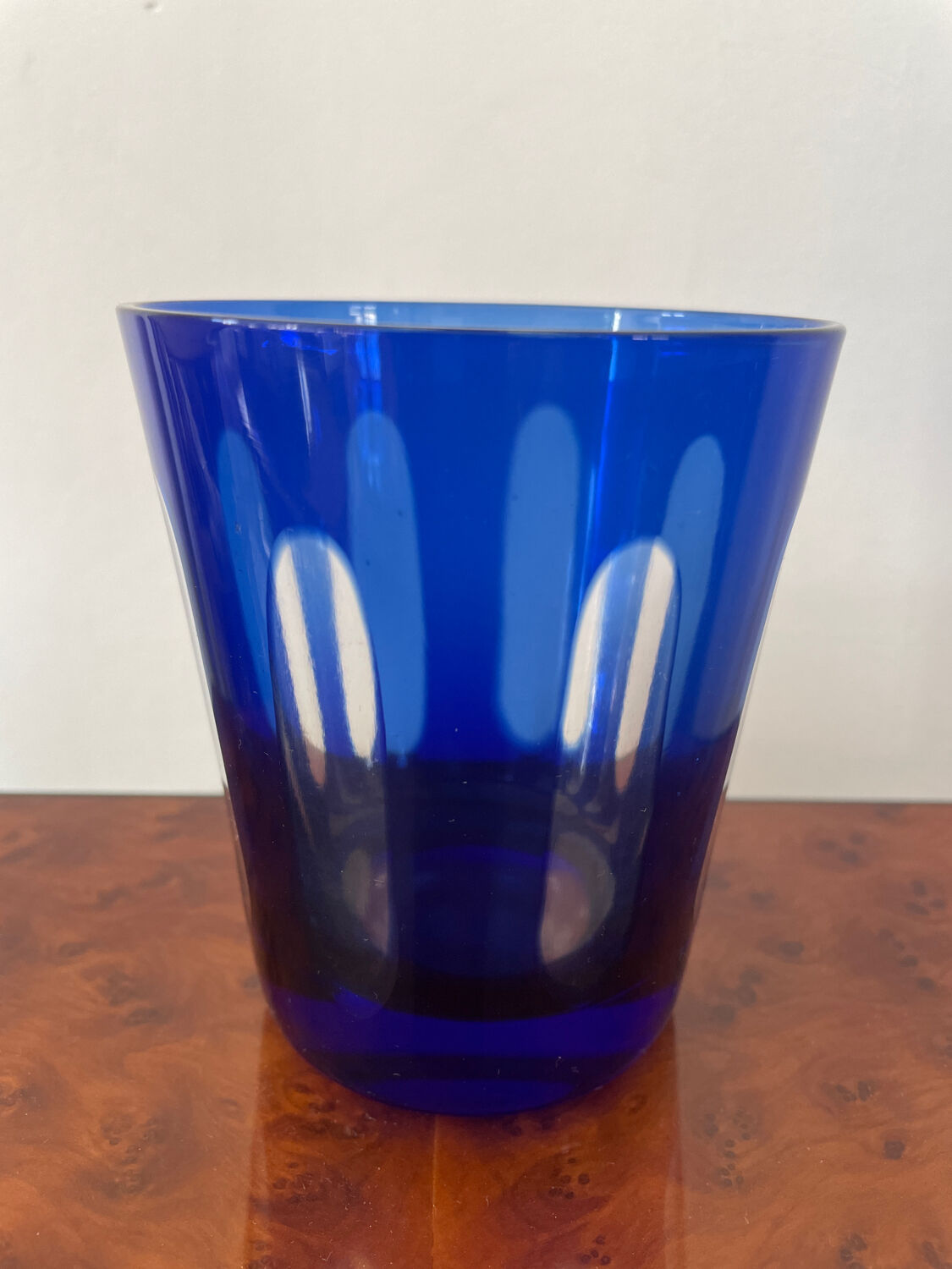 Antique crystal glass lined blue.