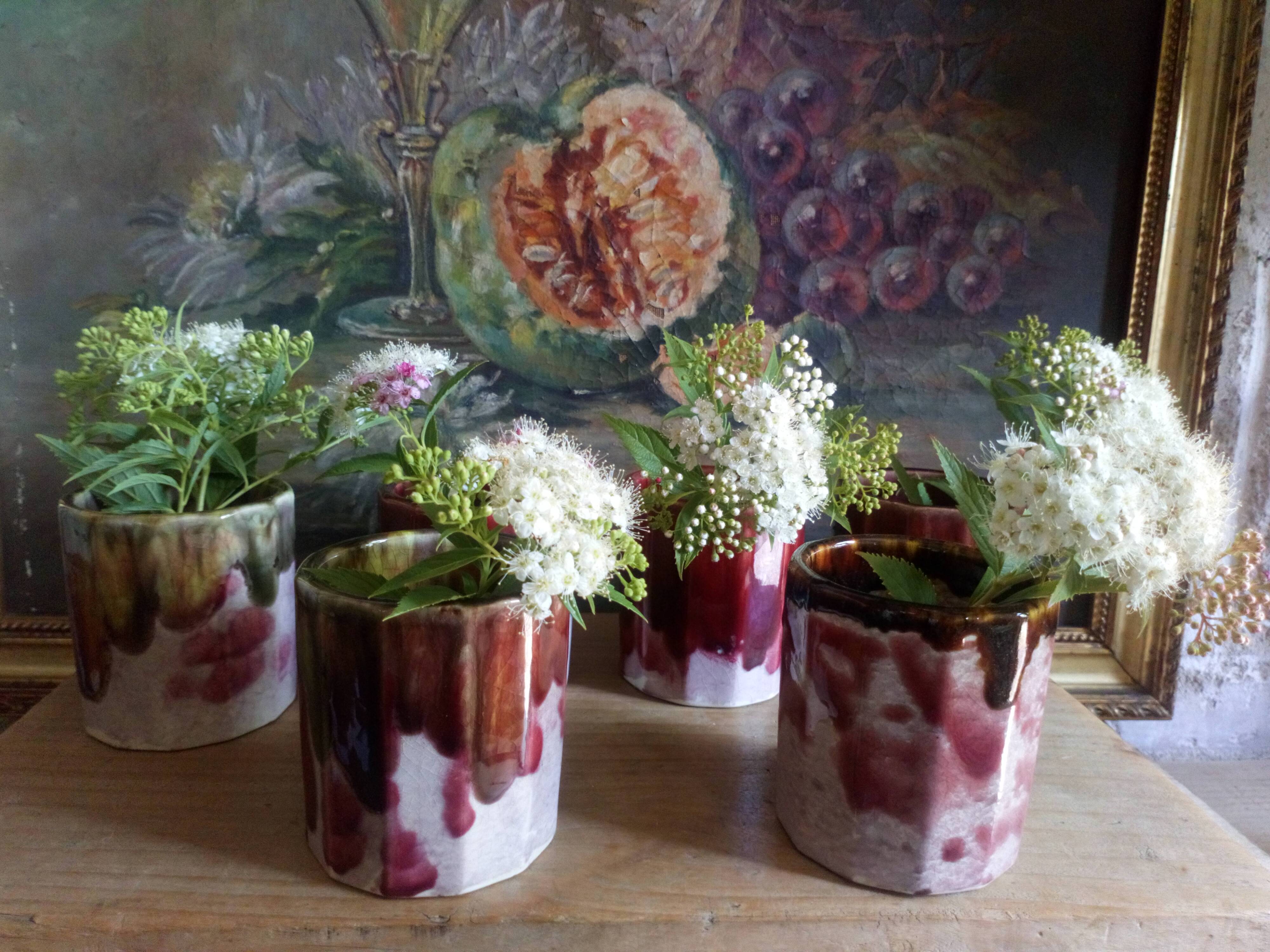 Six old yoghurt pots in enamelled porcelain