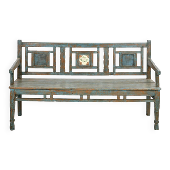Bench in old patinated teak