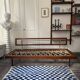 Vintage wooden sofa – modernist design, green mottled fabric