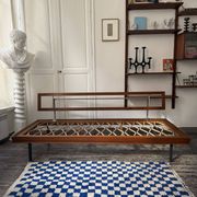 Vintage wooden sofa – modernist design, green patterned fabric