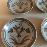 Vintage hollow plates in sandstone series of four marked Longchamp