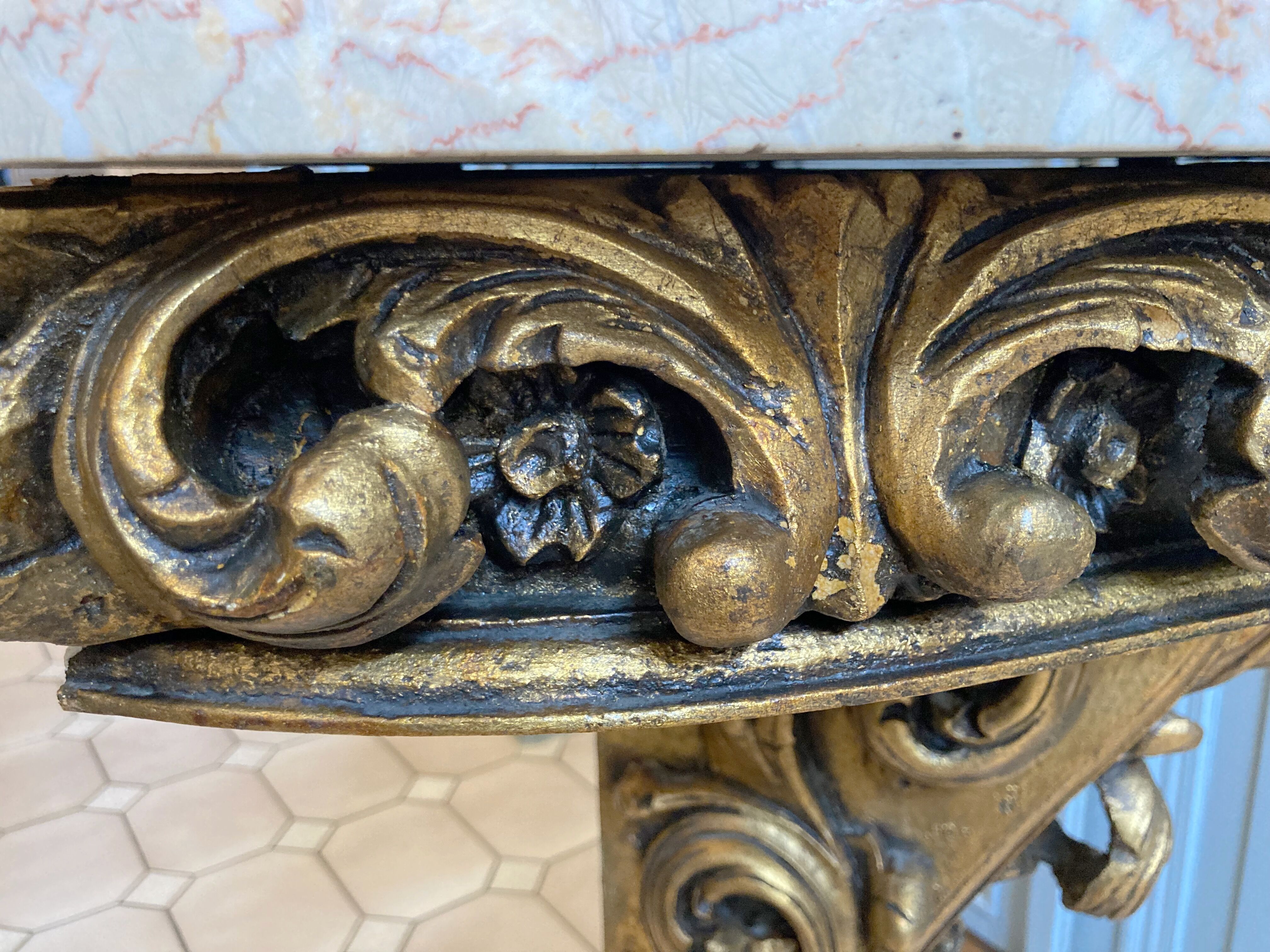 Carved wooden and marble console