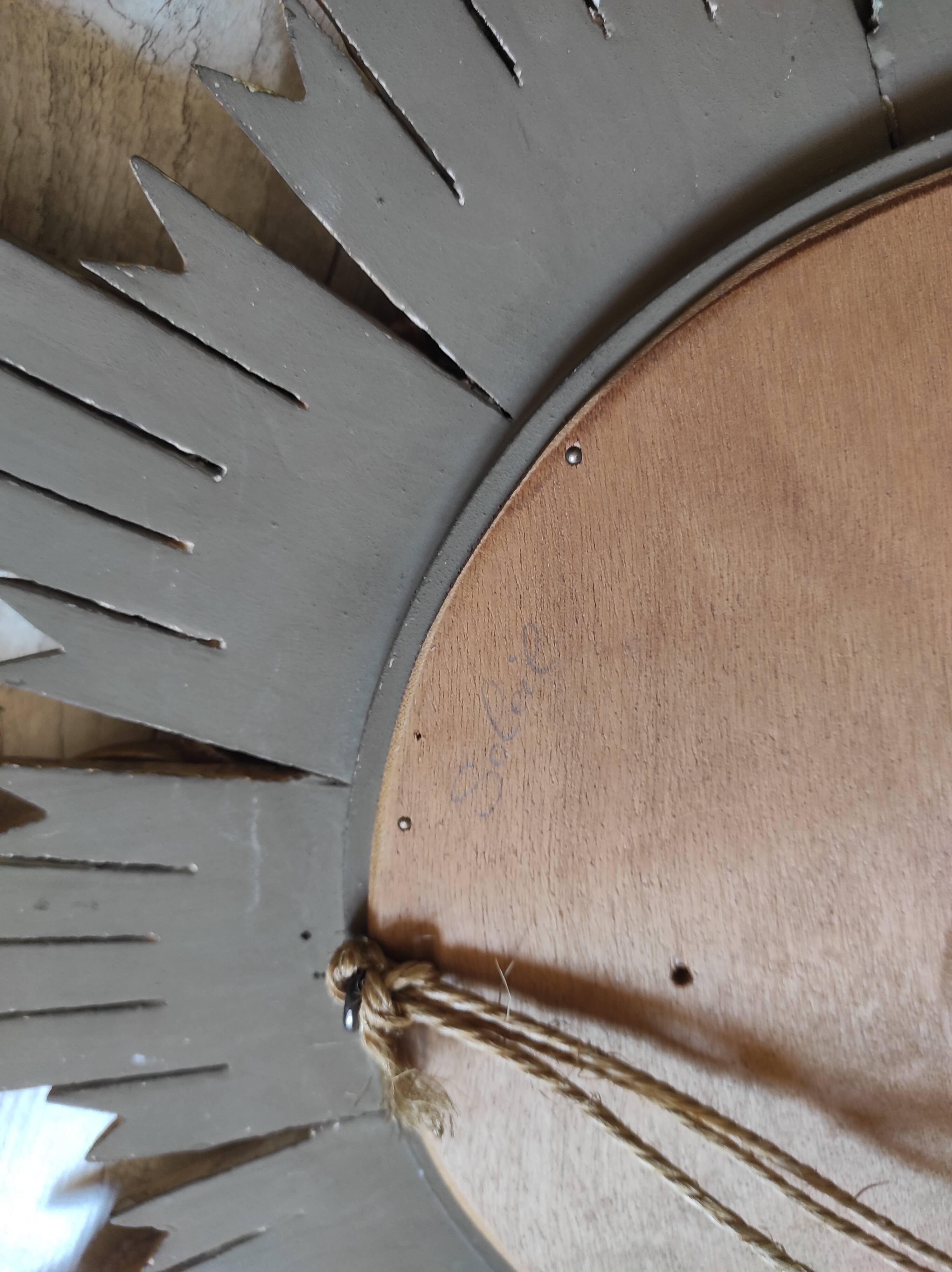 Sun mirror and witch's eye in gilded wood