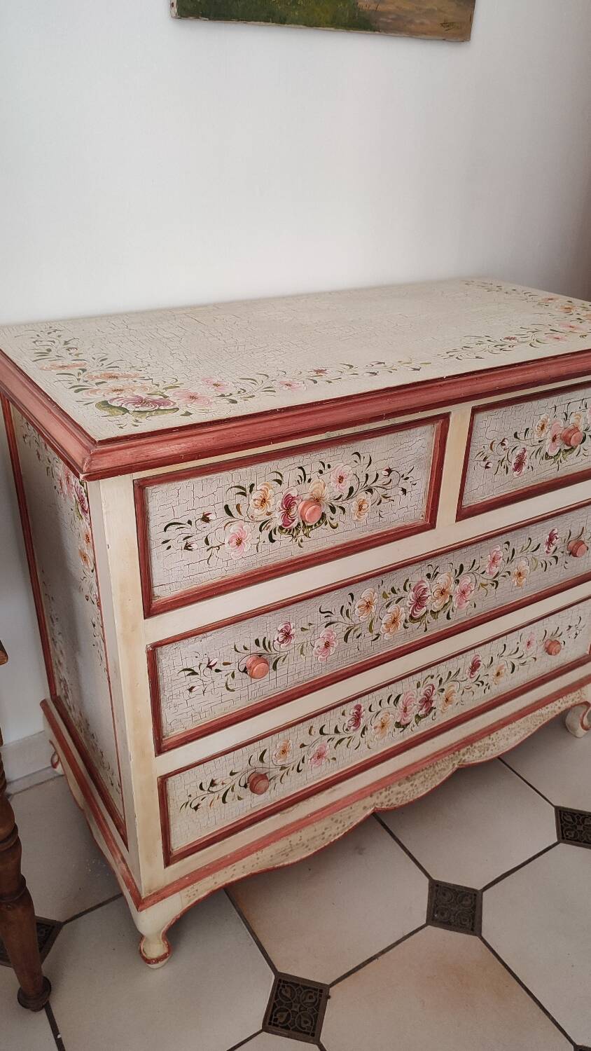 Painted chest of drawers with floral decoration
