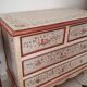 Painted chest of drawers with floral decoration