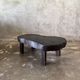 Small old Asian wooden coffee table in Japanese style, kidney-shaped top