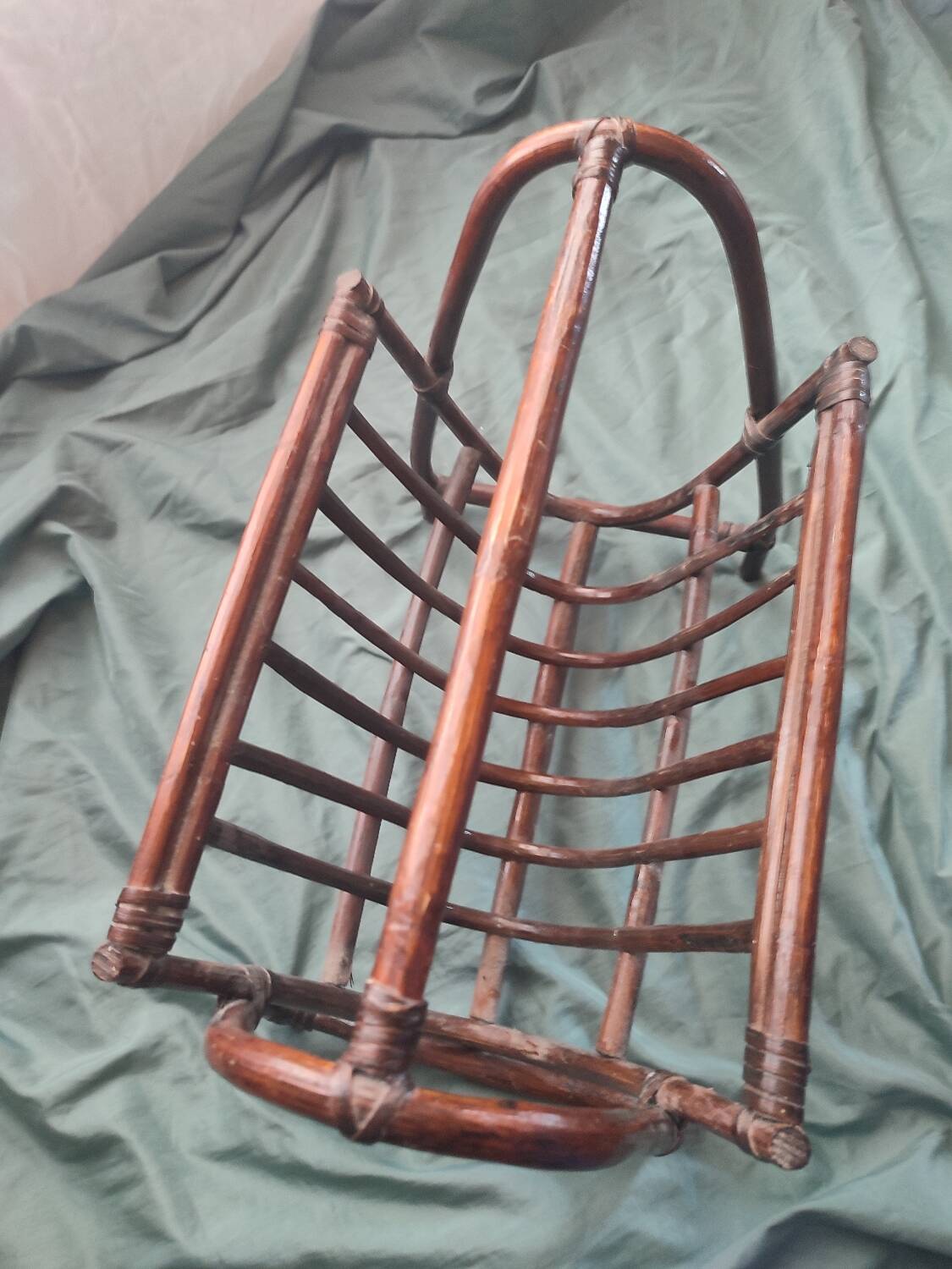 Dark rattan magazine rack