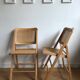 Pair of folding chairs in caning