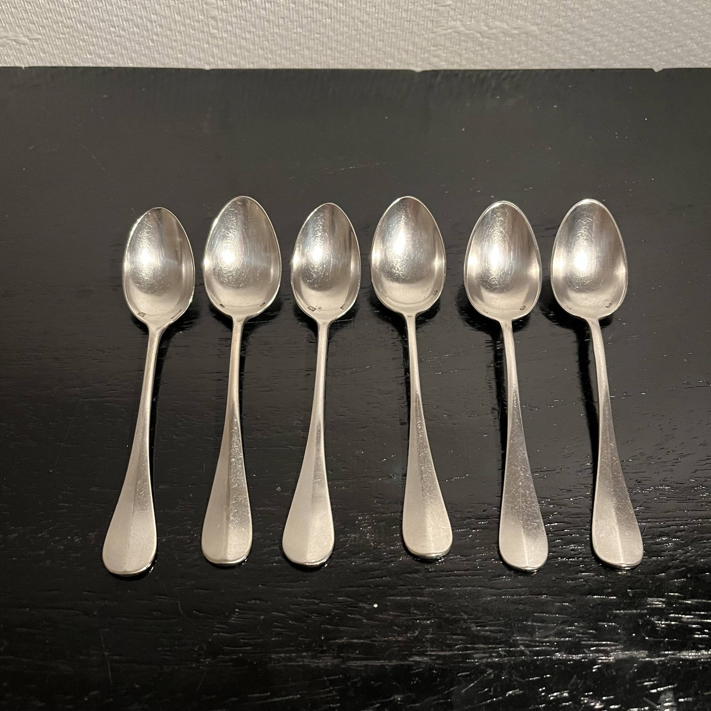 Small silver-plated metal spoons
