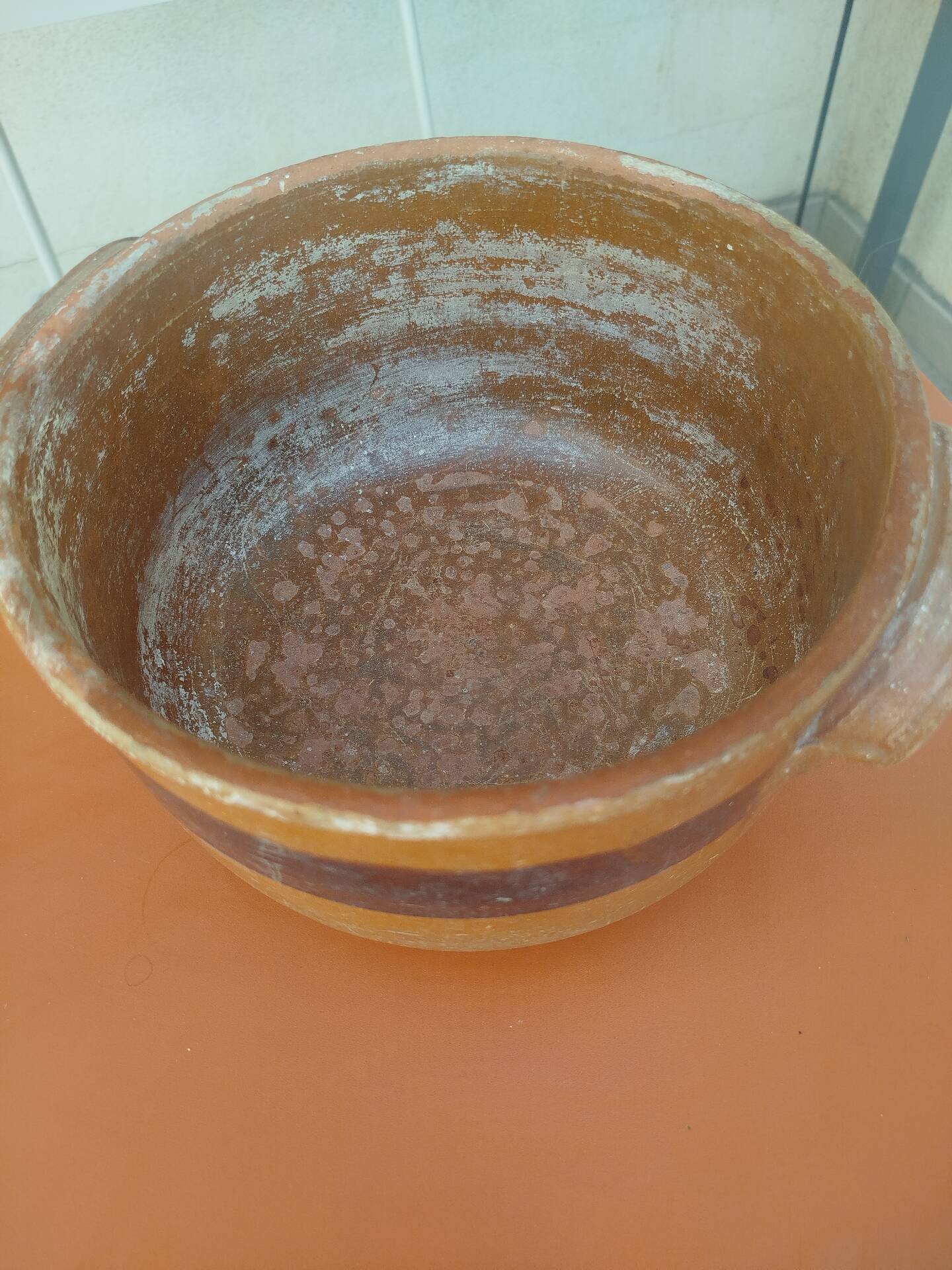 Old terracotta casserole