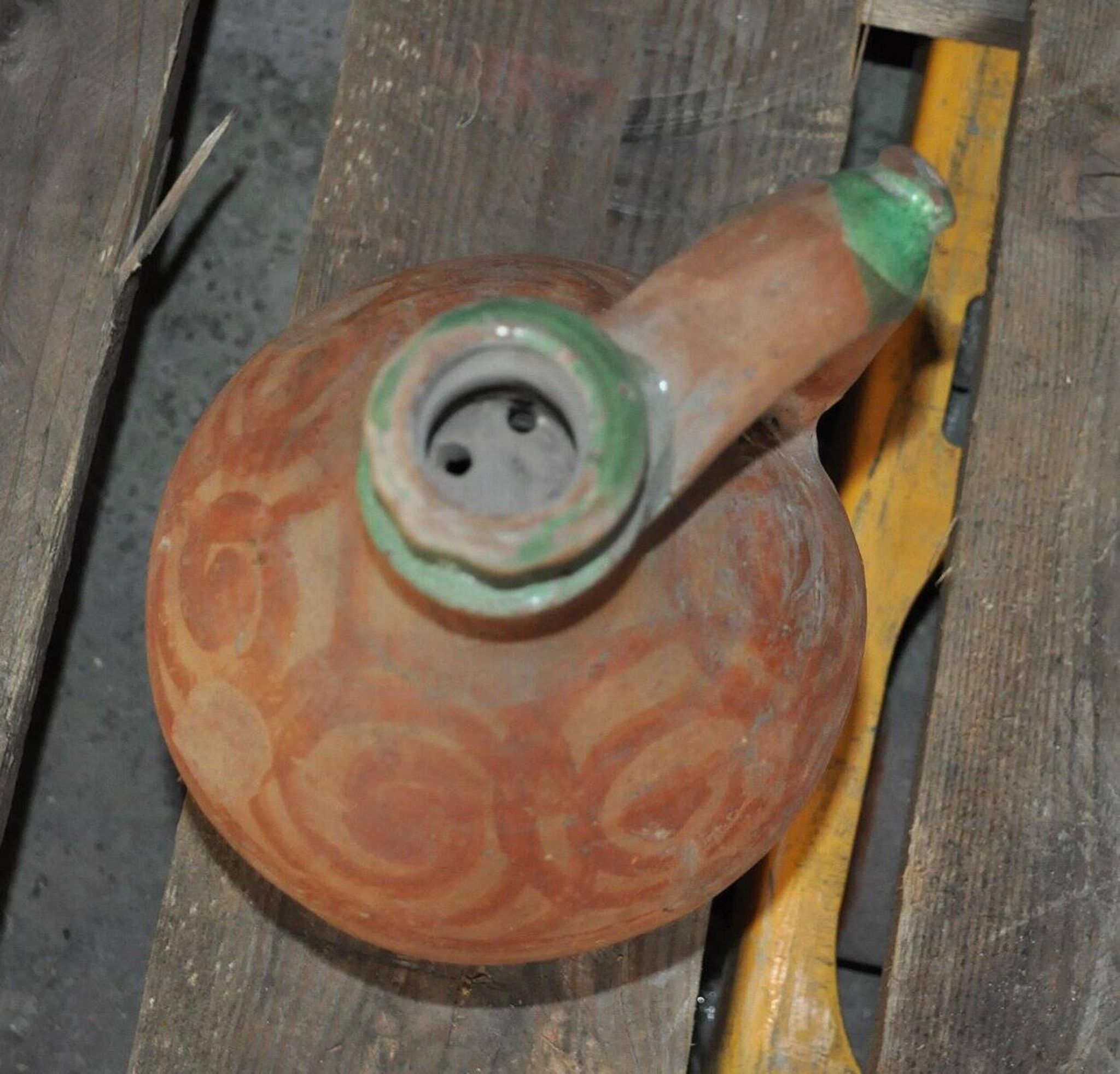 Antique red and green terracotta carafe, rustic Hungarian jug from the 1920s.