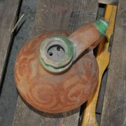 Antique red and green terracotta carafe, rustic Hungarian jug from the 1920s.