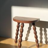 Turned wooden tripod stool