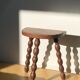 Turned wooden tripod stool