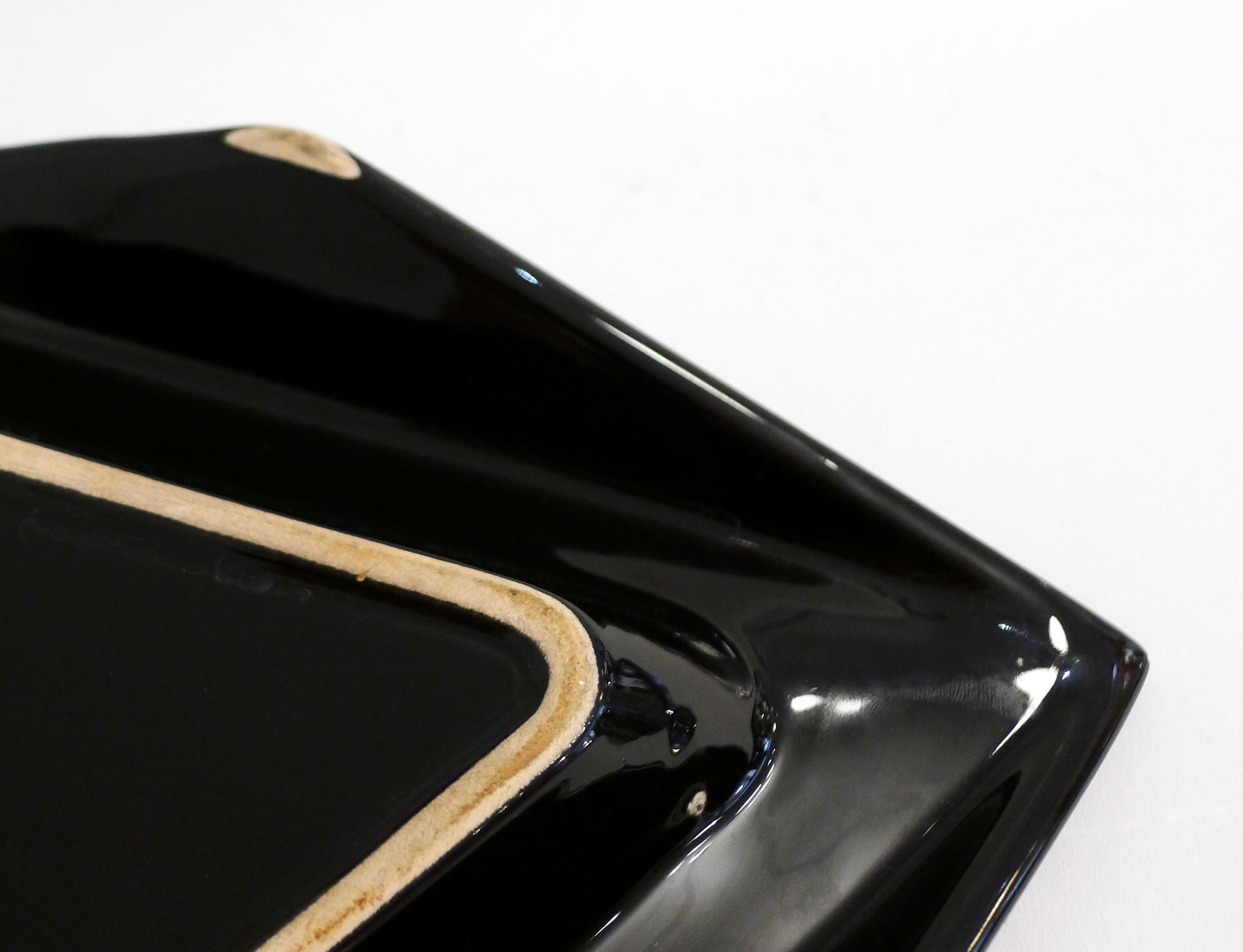 Black triangular trinket bowl