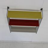 Minimalistic fifties metal metal wall system for Tomado Holland