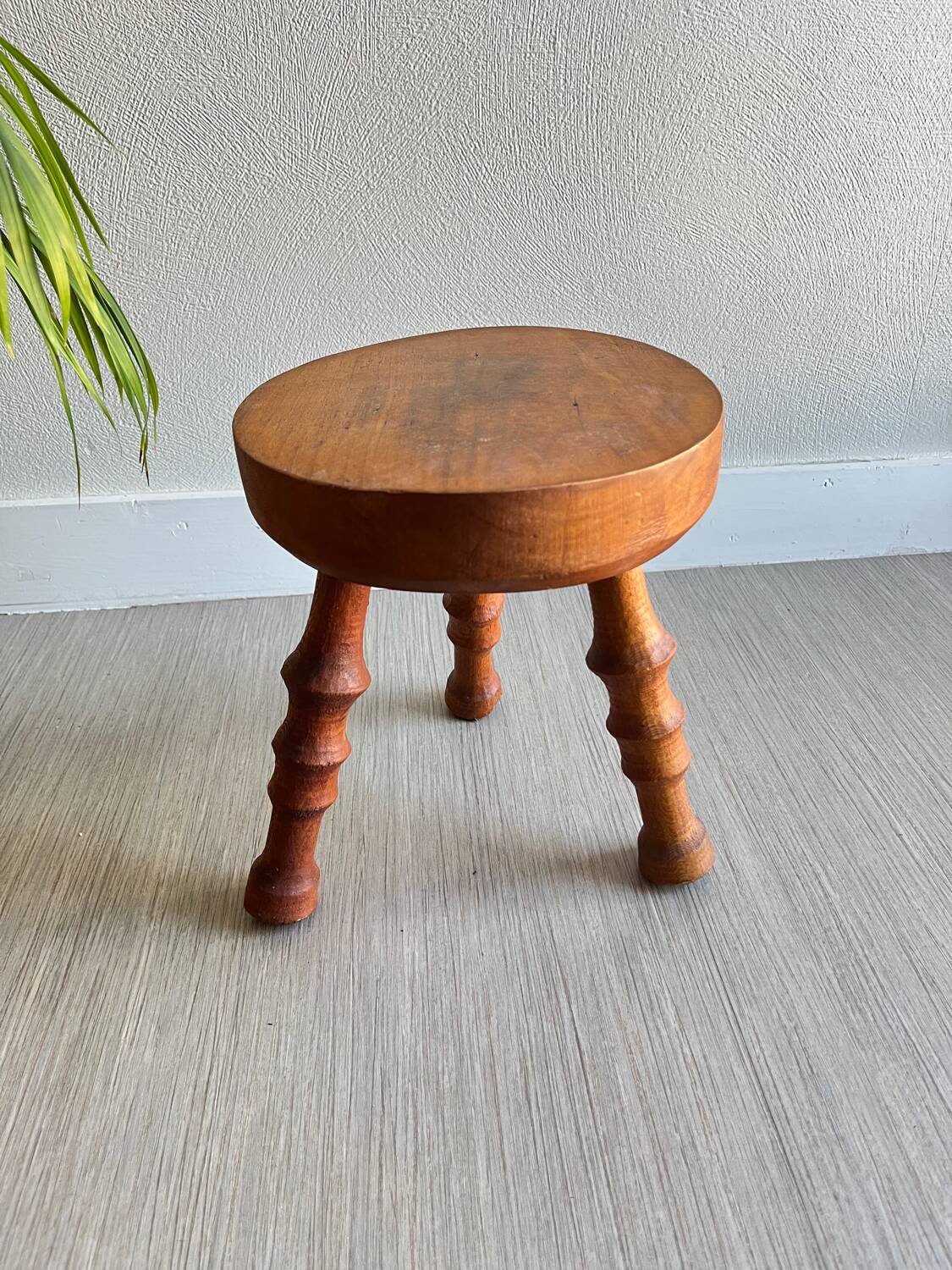 Wooden tripod stool