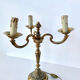 Three-branched golden candlestick
