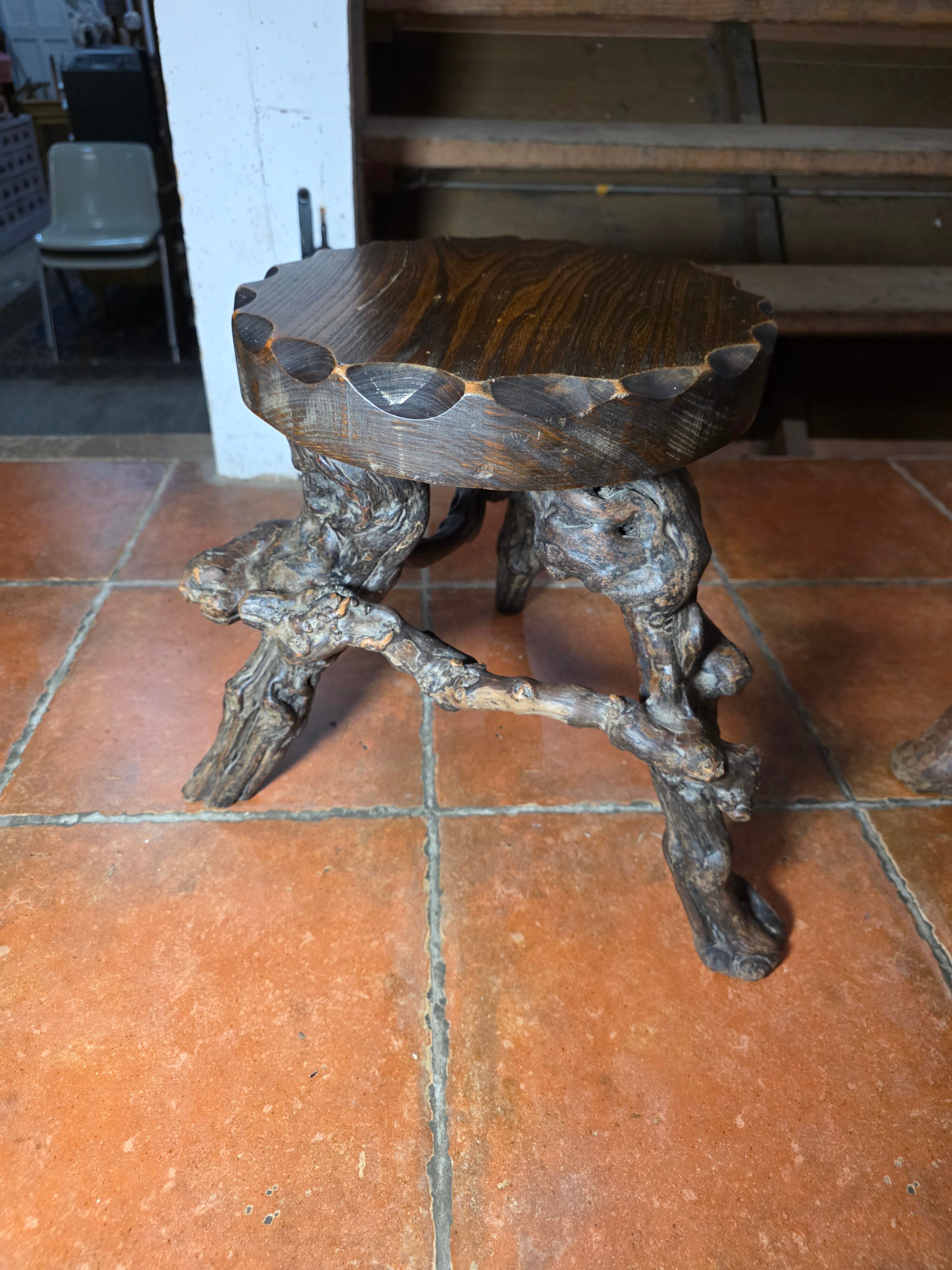 Pair of tripod stools with vine legs, oak top.