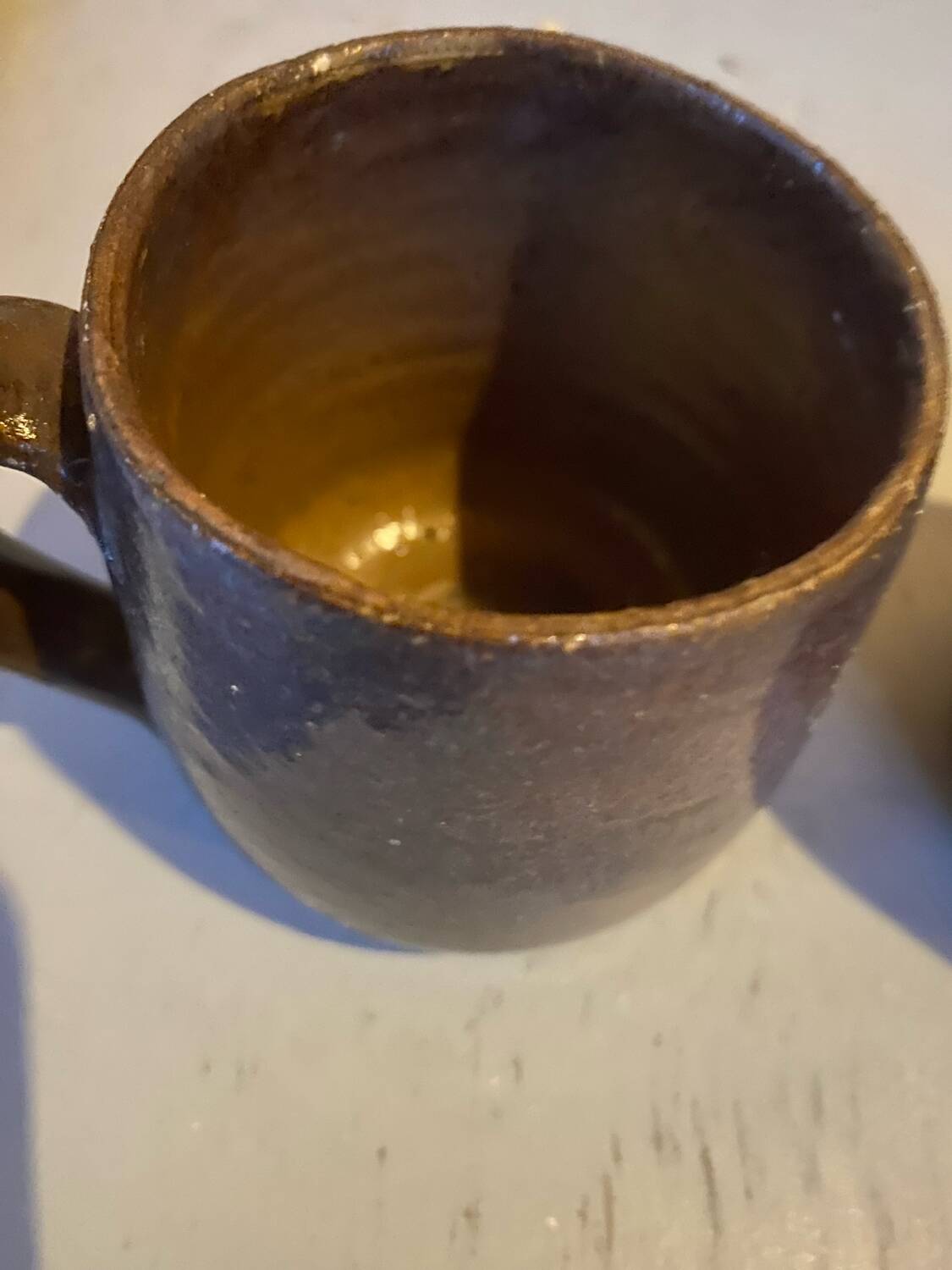 Sets of signed glazed stoneware mugs