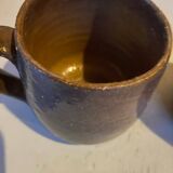 Sets of signed glazed stoneware mugs