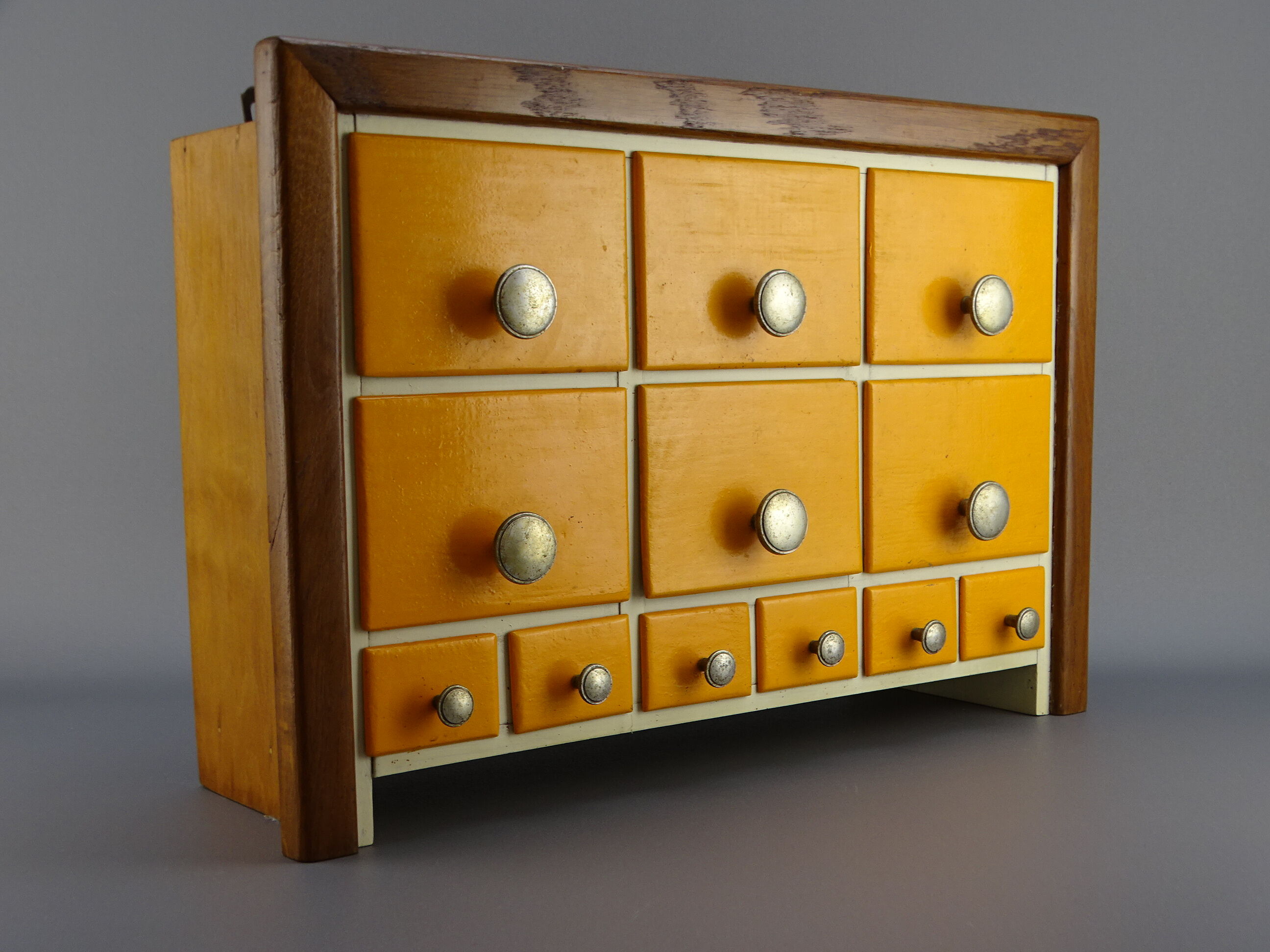 Cabinet loom shelf with drawer layette style