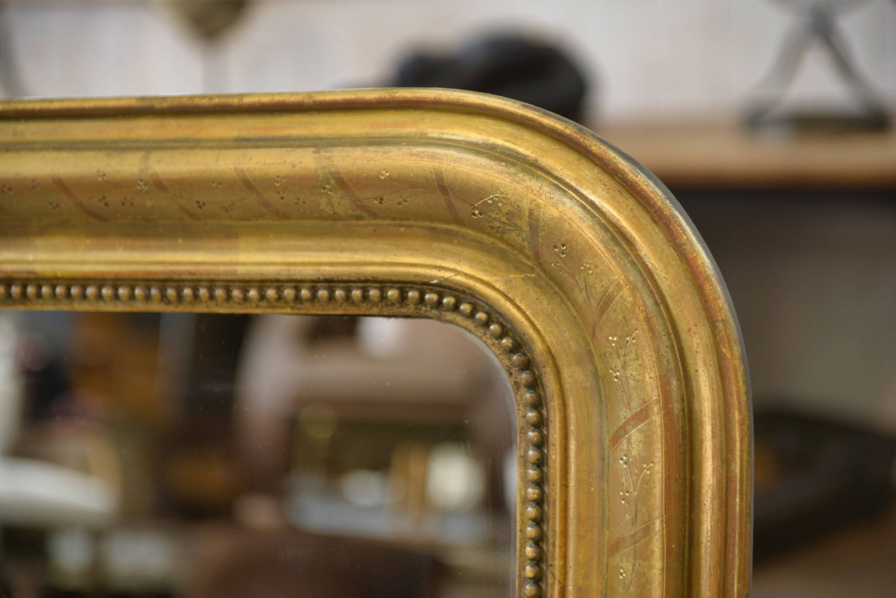 Mercury mirror from the Louis Philippe period, gilded with gold leaf, 19th century.