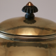 Old kettle with copper stove