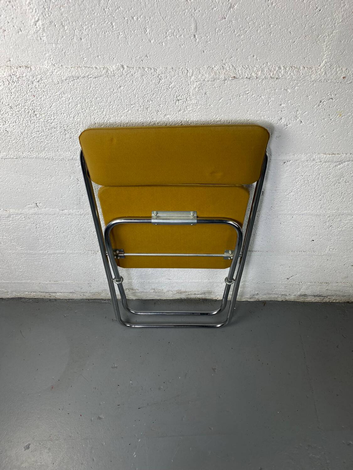 Mustard yellow folding chair