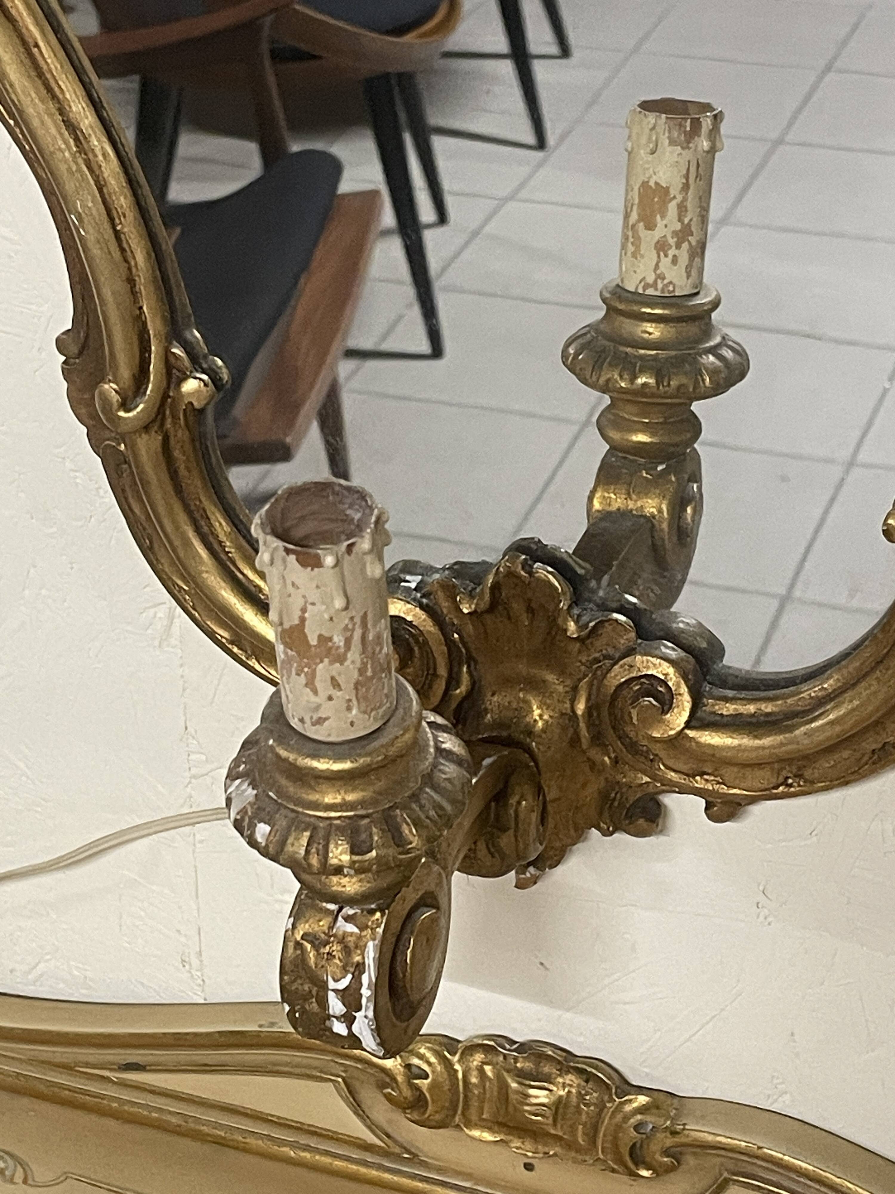 Pair of wall-mounted consoles with a mirror in Louis XV style.