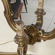 Pair of wall-mounted consoles with a mirror in Louis XV style.