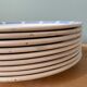 Lot de 9 assiettes plates vintage en porcelaine opaque de Badonviller