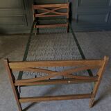 Bed with green metal braces 1960 a person foldable