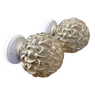 Pair of golden Scandinavian globe wall lights