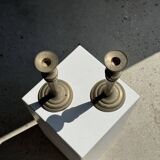 Pair of classic candlesticks in patinated gold metal H25
