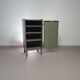 Gray metal locker. Industrial small sideboard.