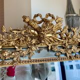 Large mirror style Louis XVI in gilded wood with parecloses xixth h: 165 cm
