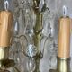 19th-century wall sconce, bronze and crystal pendants.