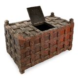 Large wooden and metal chest with red patina
