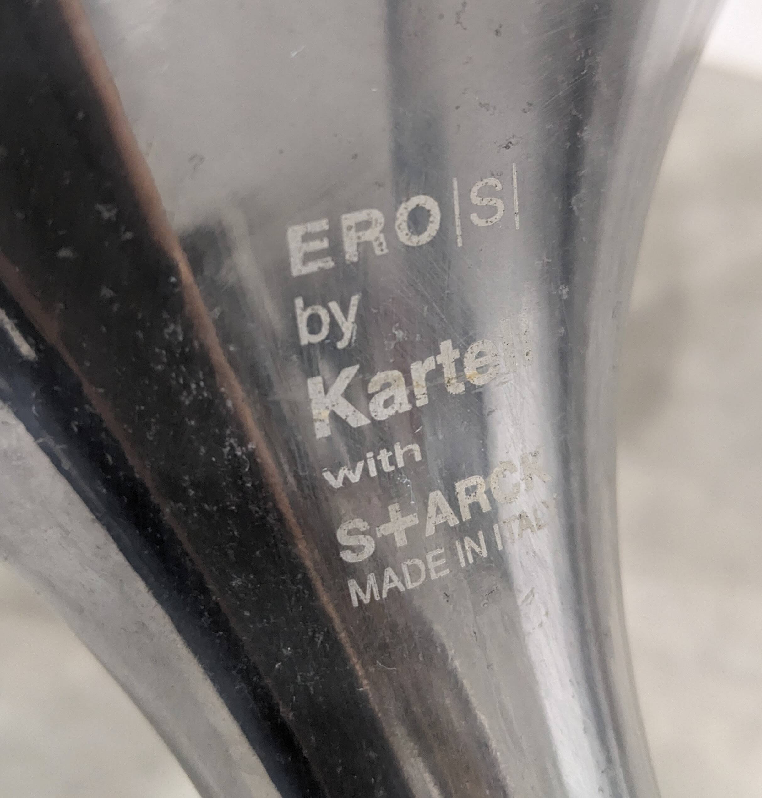 Two Kartell Eros chairs