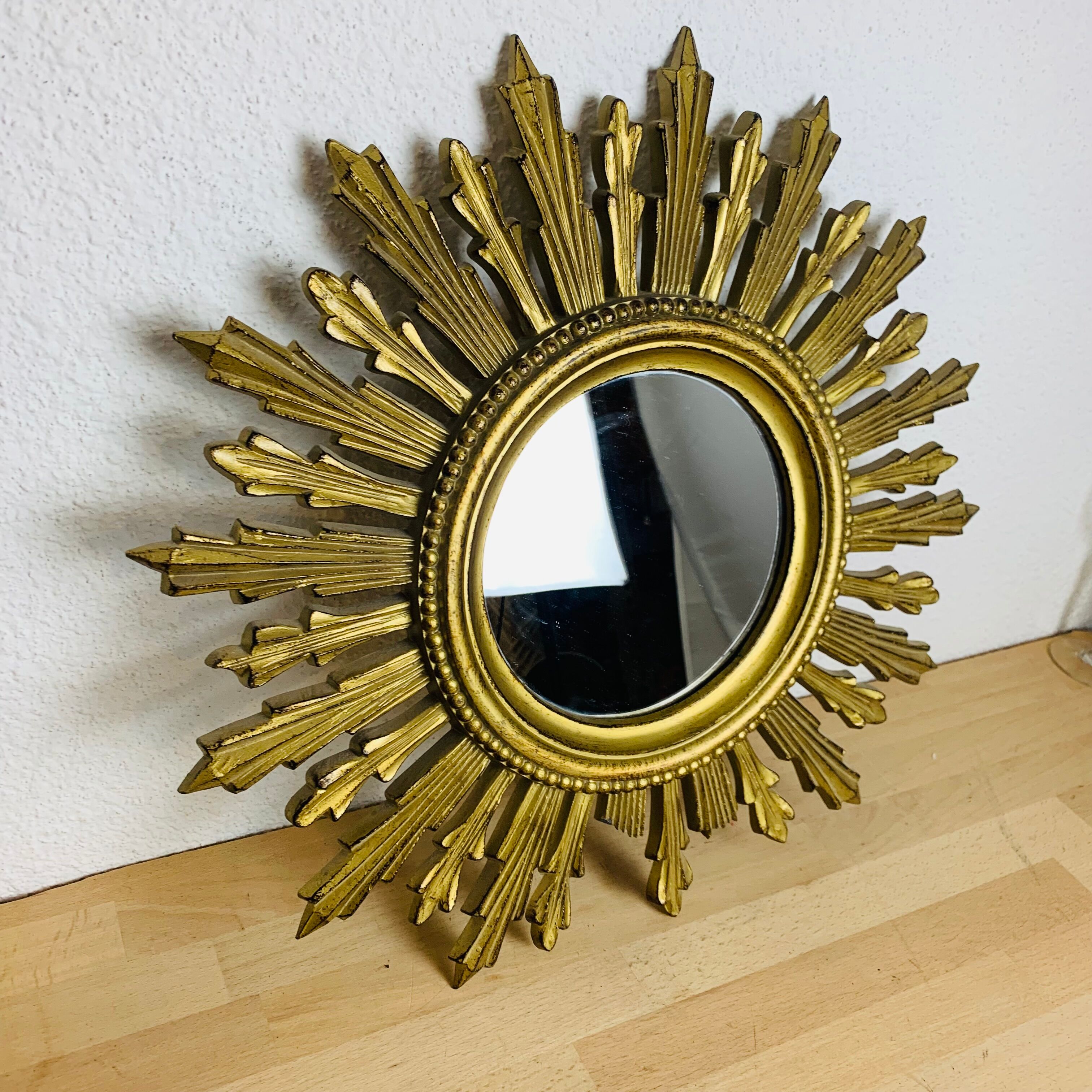 Miroir soleil doré italien années 60 résine