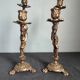 Pair of antique candlesticks in cherub bronze