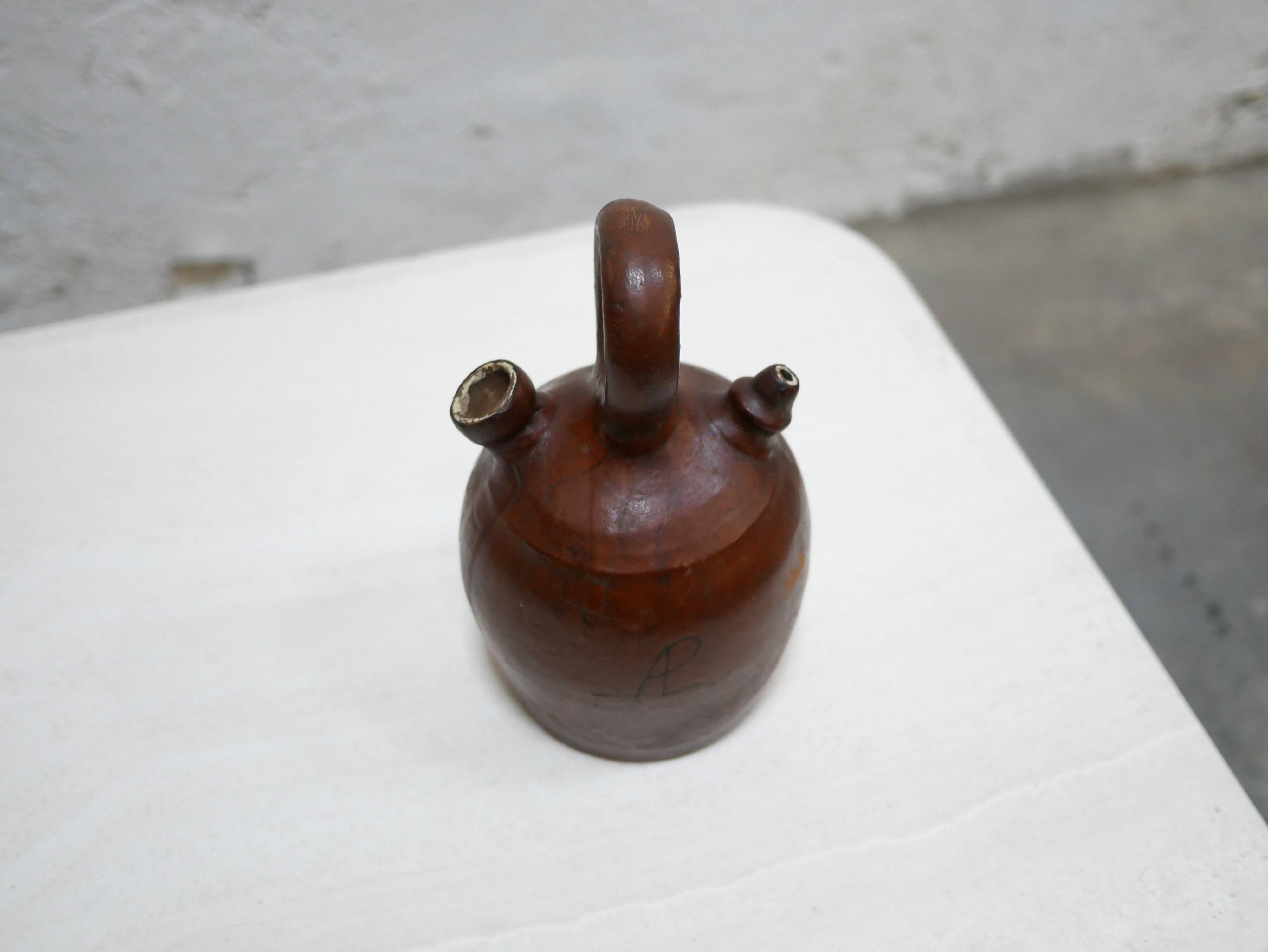 Vintage leather gargoulette pot