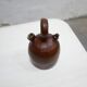 Vintage leather gargoulette pot