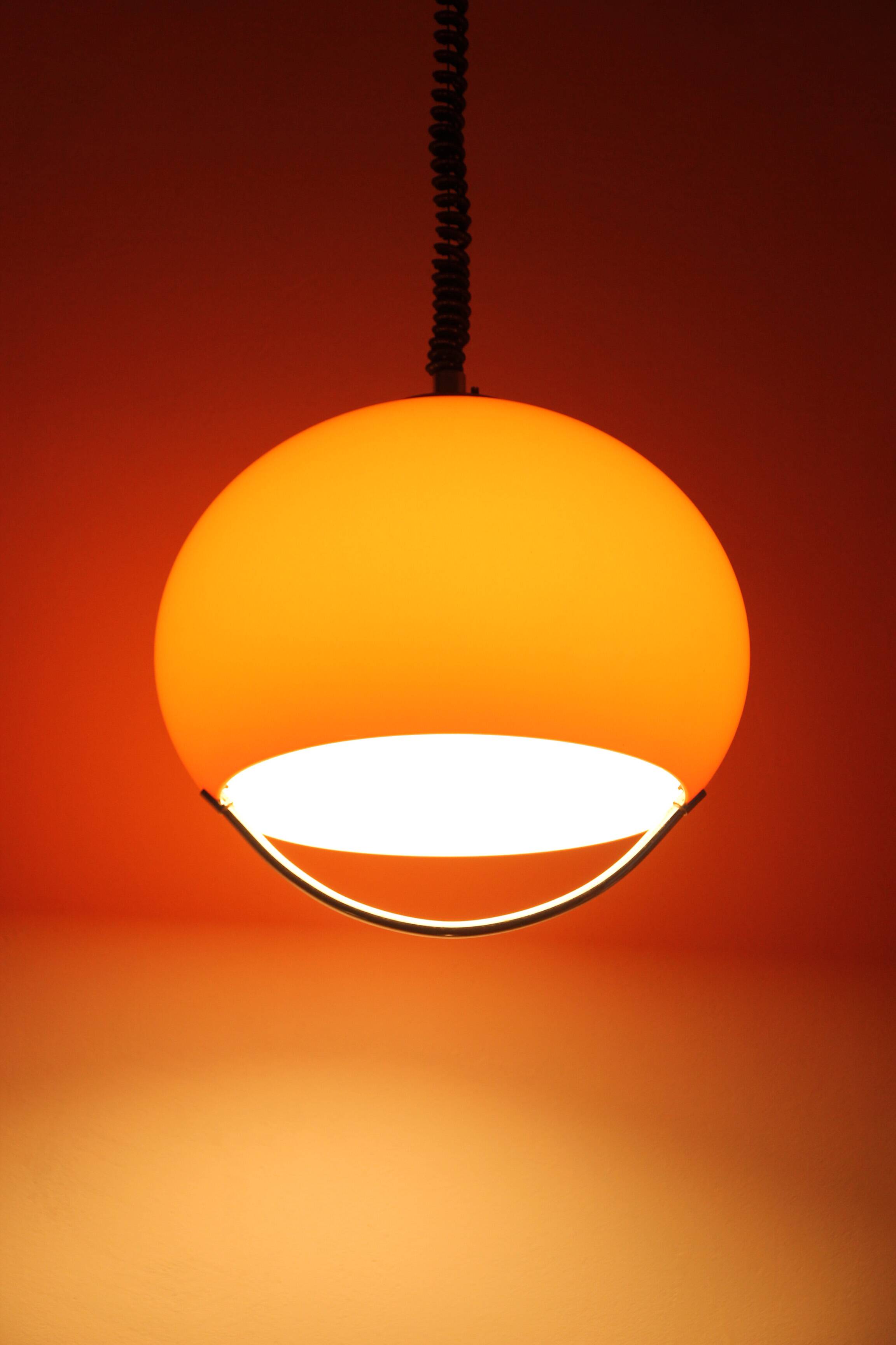 Guzzini Jolly suspension model in orange, 1968.