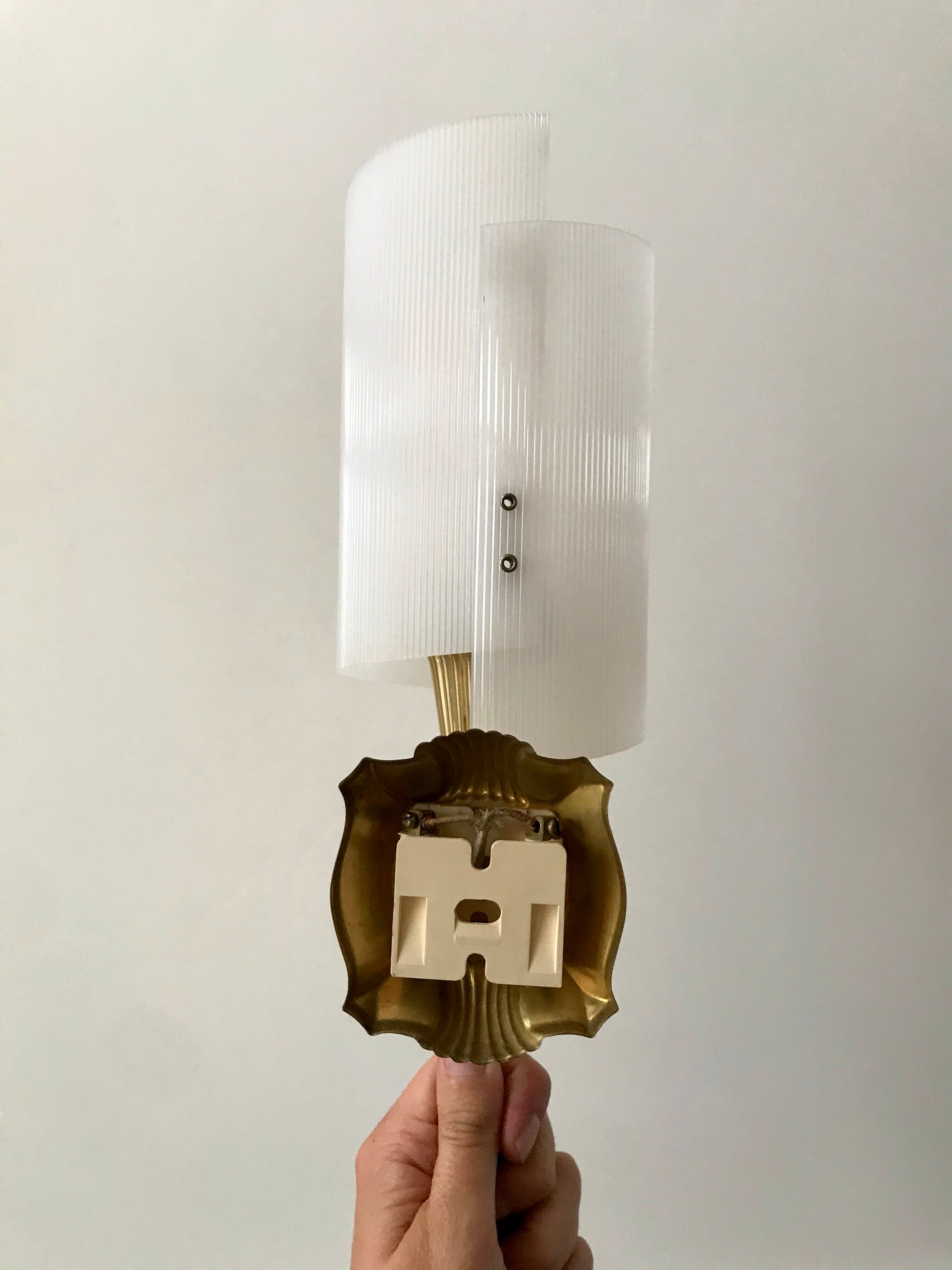 Pair of gold steel wall lamps, plexi and pleated plastic shades 60s-70s